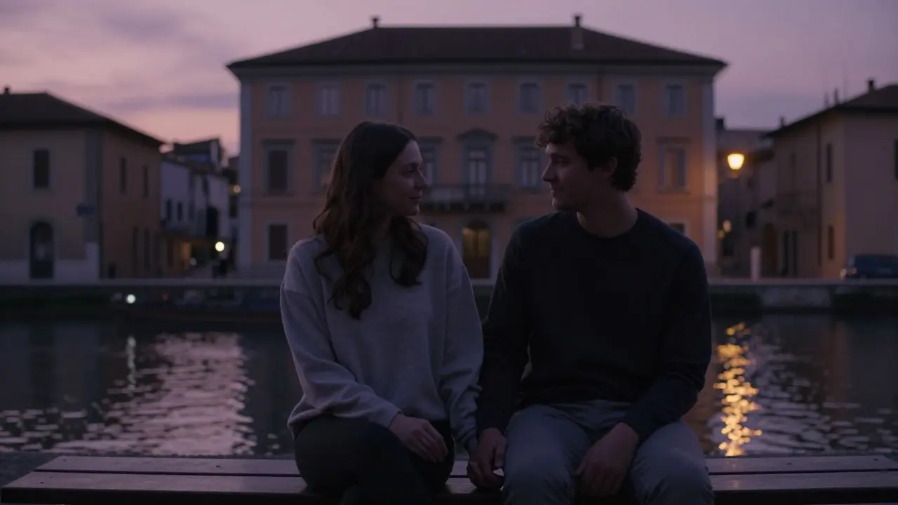 A couple holds hands in quiet connection outside a Milan canal after their therapeutic session.